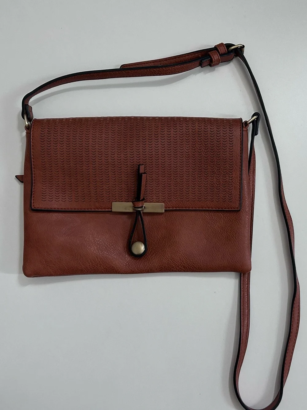 Brown Leather Crossbody Bag with Textured Flap
